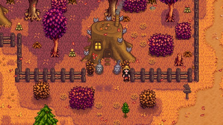 عائلة الراكون في Giant Stump في وادي Stardew.
