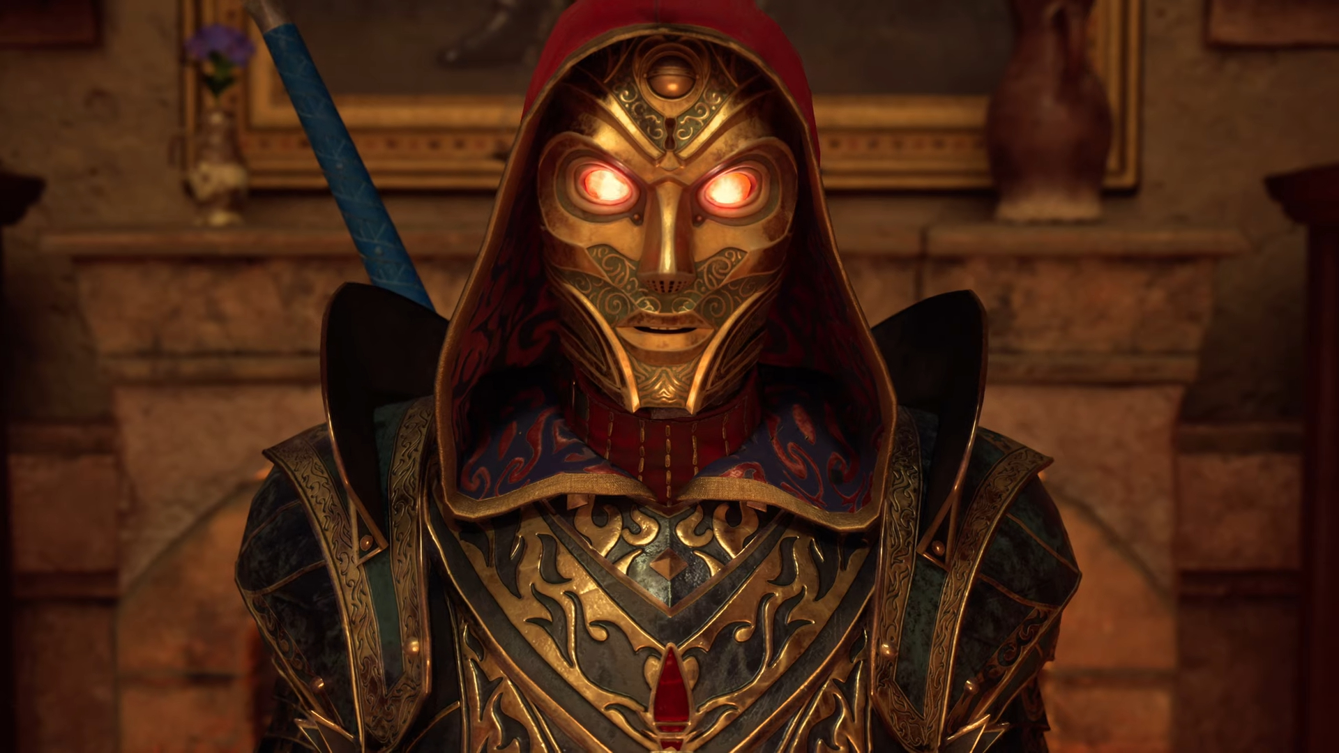 شخصية ملثمة في معلن. يبدو القناع وكأنه مصنوع من الذهب ، وله عيون حمراء متوهجة ، وهناك غطاء فوق رأسه.