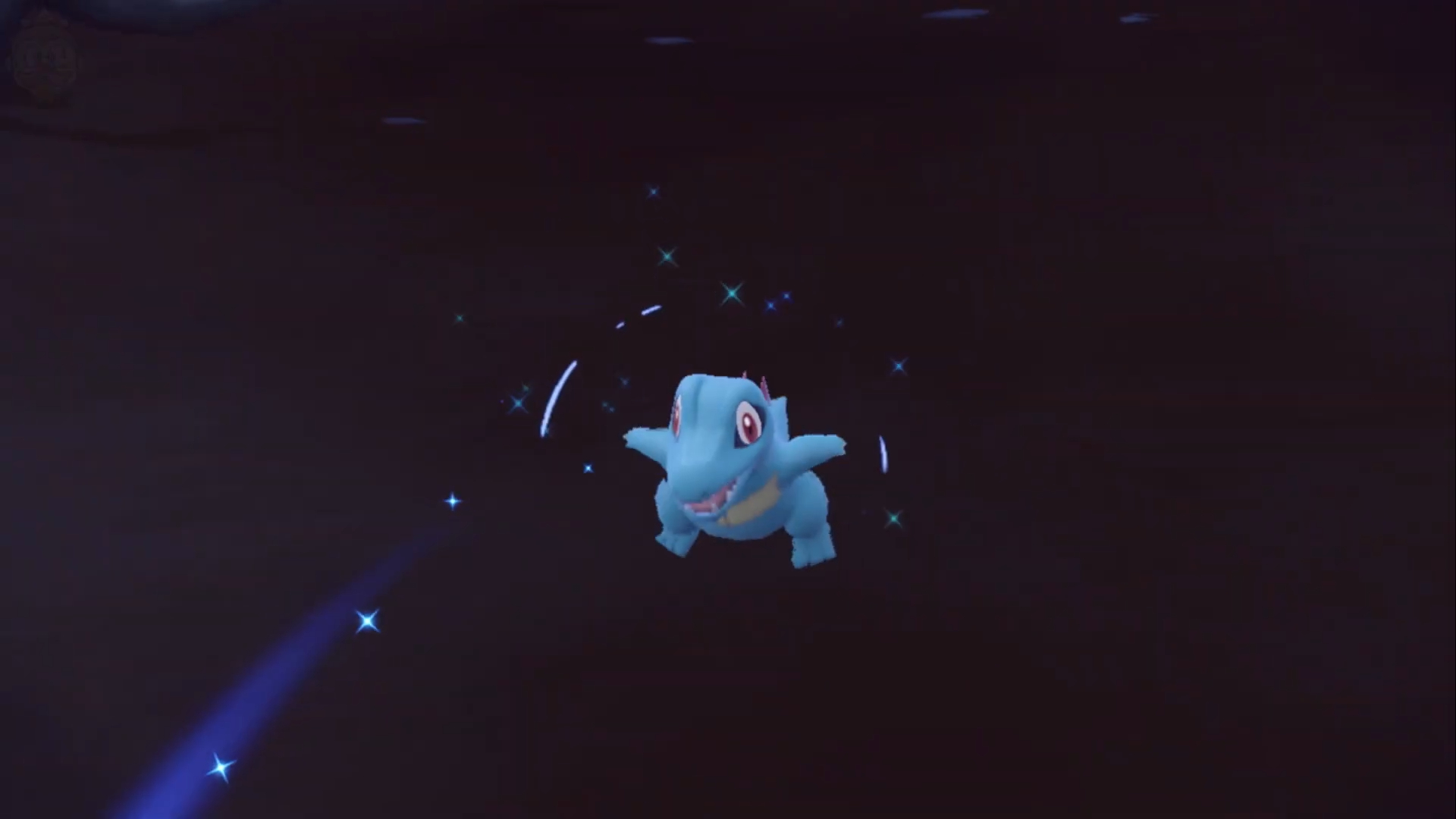 totodile في الماء في بوكيمون.